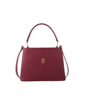 Maroon bag with contrast handle and metallic logo.