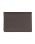 Brown leather card case with elegant design.