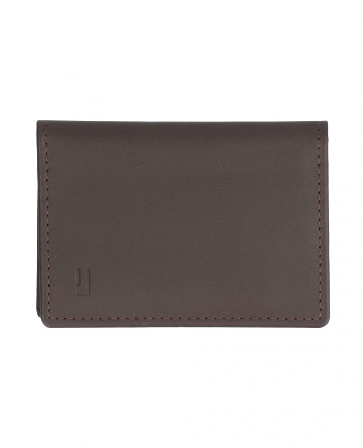 Brown leather card case with elegant design.